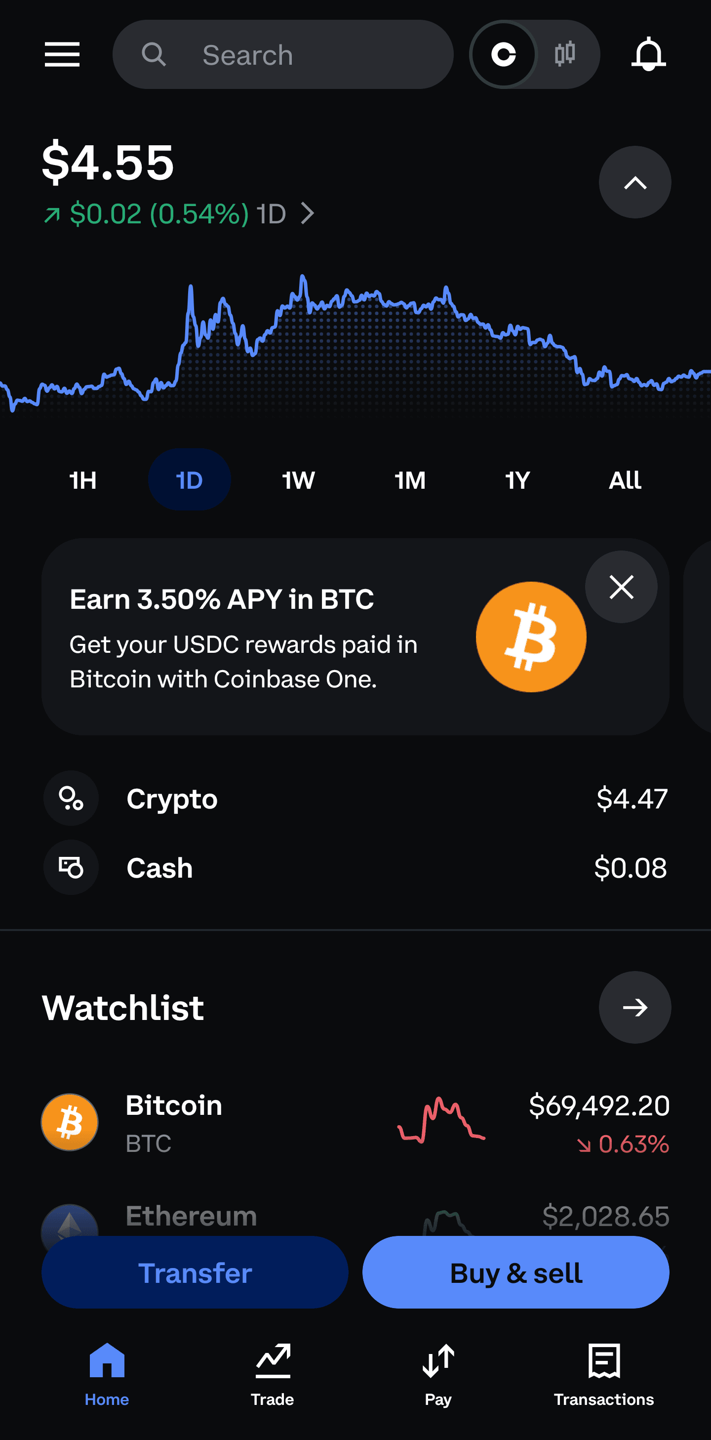 Coinbase home screen showing the Transfer button.